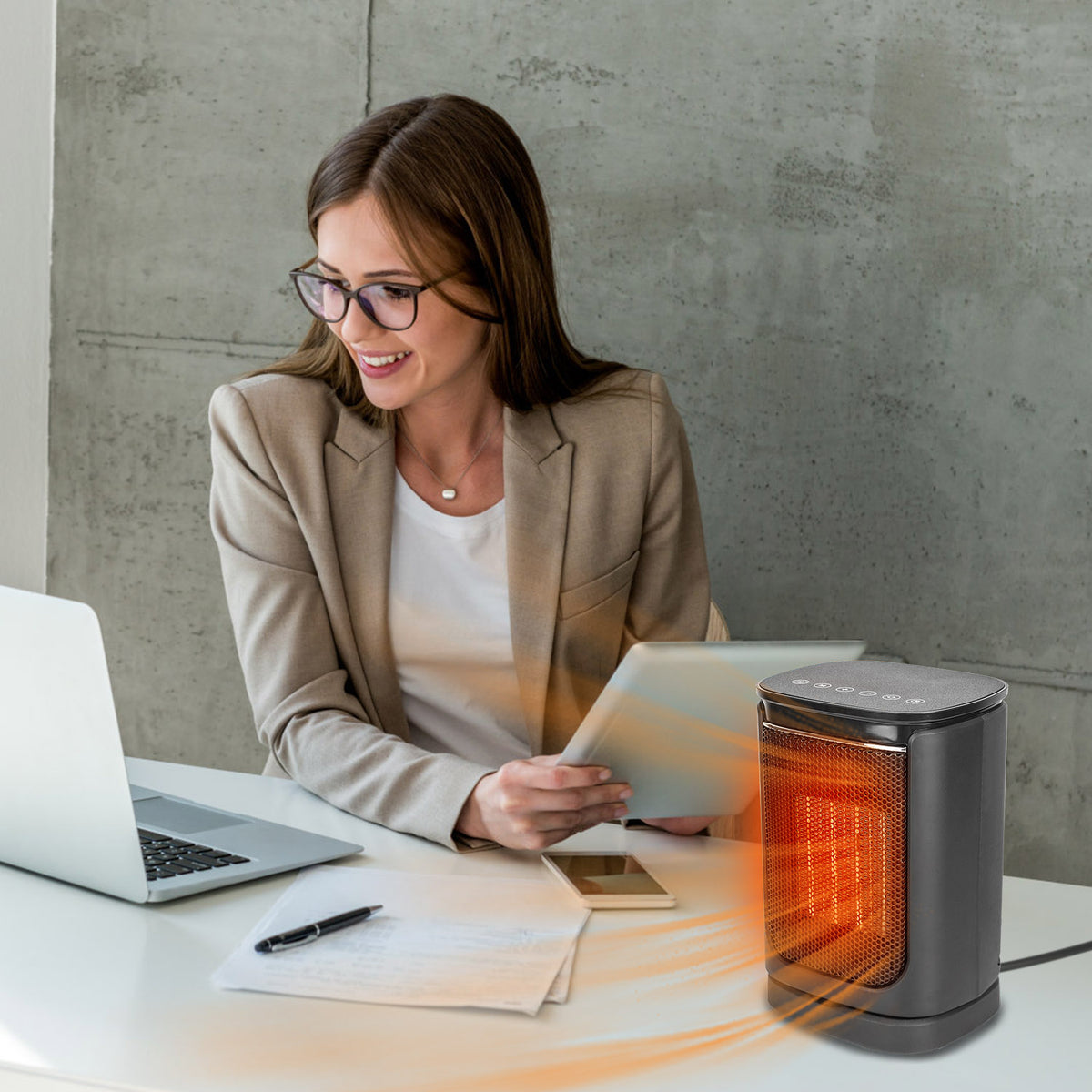 Space heater beside a home office desk