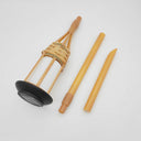 Bamboo torch lamp head and stake pieces laid out flat