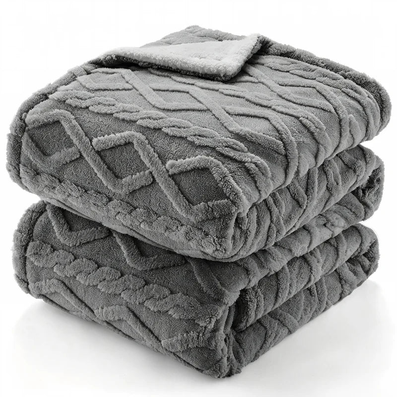 Folded grey heated throw blanket with sherpa reverse