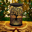 Vintage metal solar lantern with tree-of-life cut-out