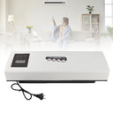 Wall mounted electric heater installed on a wall above a living space