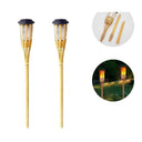 Pair of bamboo solar torch lights with flame-effect lamp heads on a white background