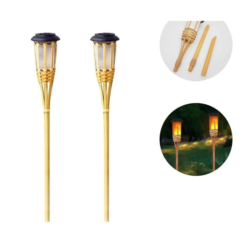 Pair of bamboo solar torch lights with flame-effect lamp heads on a white background