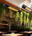 Hanging infrared patio heaters above a restaurant terrace
