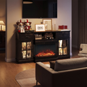 65 Inch Electric Fireplace TV Stand, Modern Media Console Entertainment Center, Storage Cabinets, Adjustable LED Flame for Living Rooms viewed across a furnished room, showing its scale against the wall