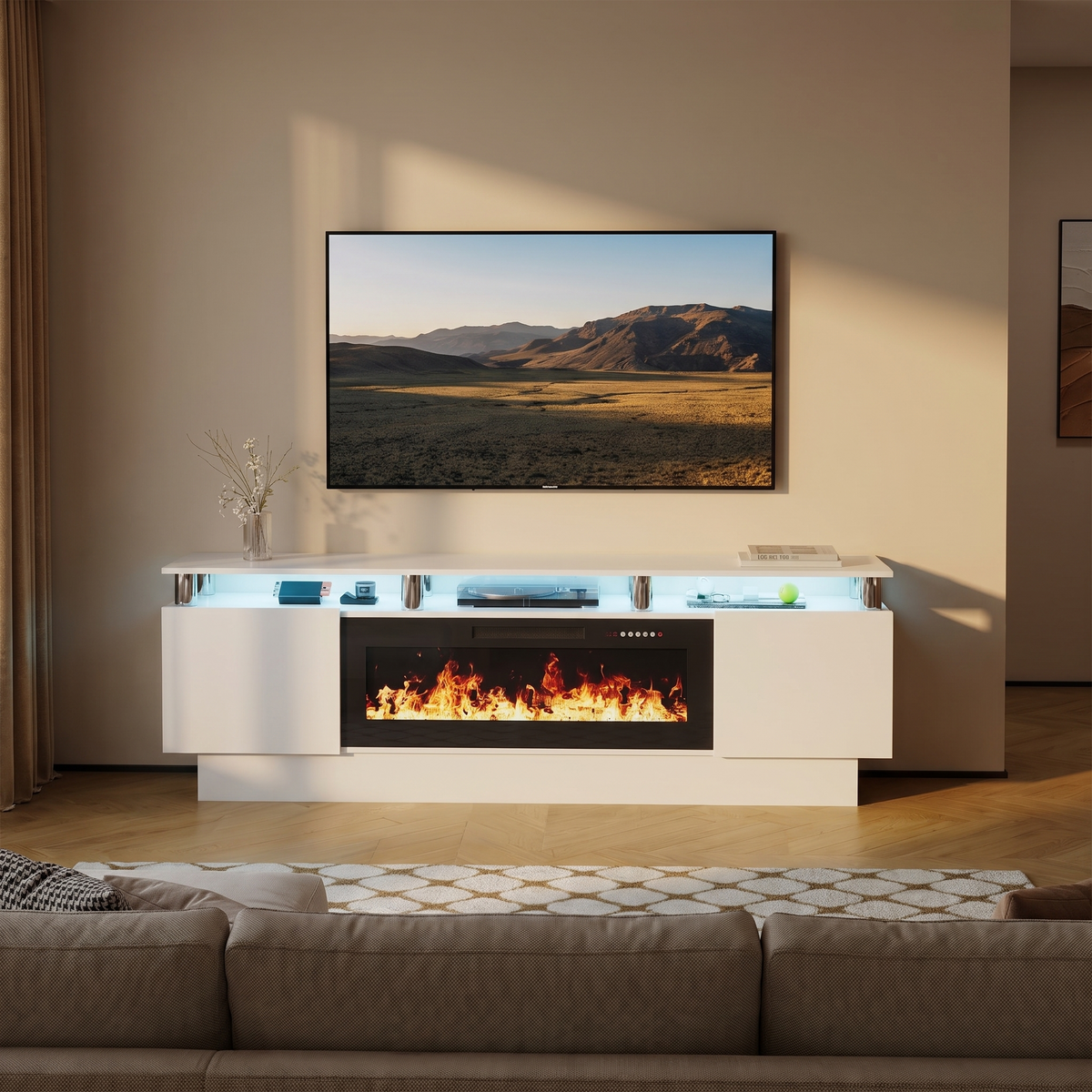 80 Inch Electric Fireplace TV Stand, Modern Media Console Entertainment Center, Adjustable LED Flame for Living Rooms viewed across a furnished room, showing its scale against the wall