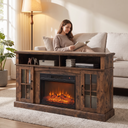 TV Stand for TVs Up to 65 Inch, Electric Fireplace TV Console w/Remote Control, Overheat Protection shown in a styled living room with a person relaxing nearby