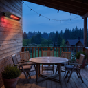 1500W Portable Infrared Electric Space Heater, Overheat Protection for Desks, Bedrooms and Home Offices viewed across a furnished room, showing its scale against the wall
