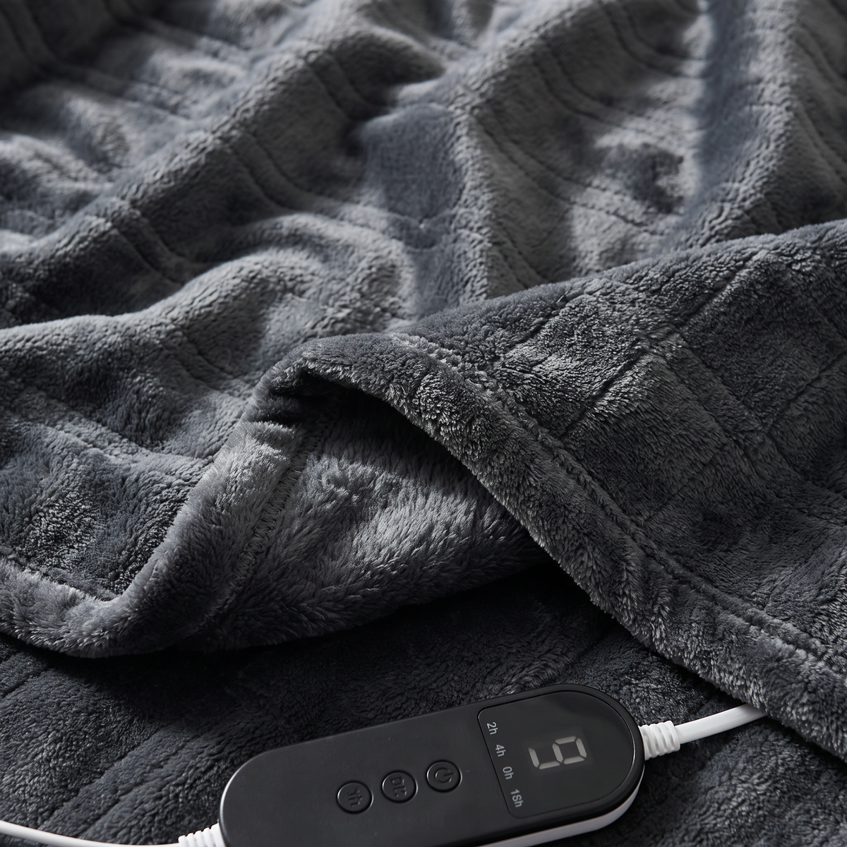 Close-up of the fabric texture and controller on the Flannel Heated Blanket with 9 Heat Levels & 12-Hour Auto-Off, 5-Second Fast Heating Electric Throw, Machine Washable