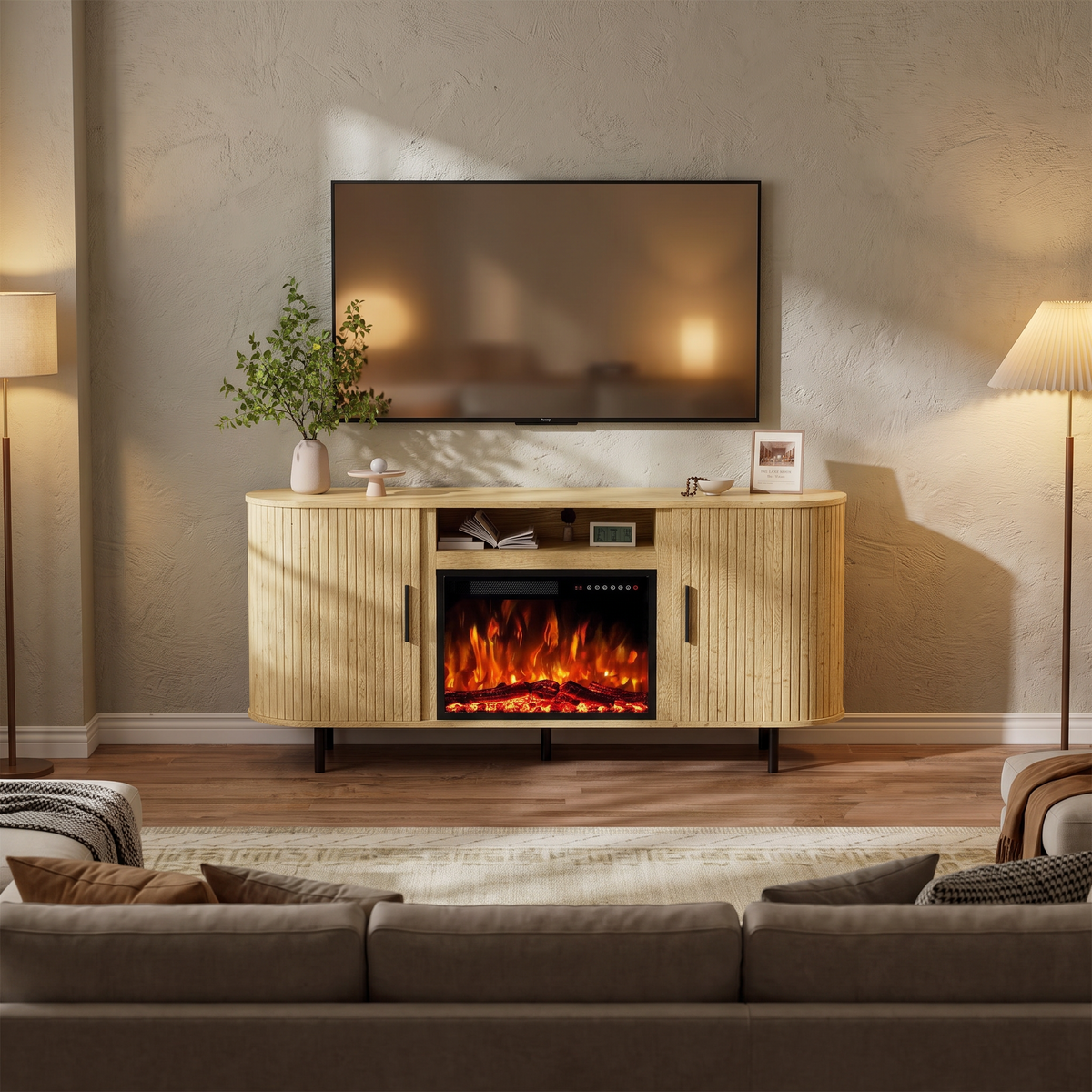 65" Fluted Fireplace TV Stand for TVs Up to 75 inches, Modern Entertainment Center with 23" Electric Fireplace, Wooden viewed across a furnished room, showing its scale against the wall