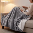 Electric Heated Throw Blanket, 5 Heat Levels, Soft Flannel Sherpa, Auto Shut-Off and Overheat Protection for Sofa and Bed shown in a styled living room with a person relaxing nearby